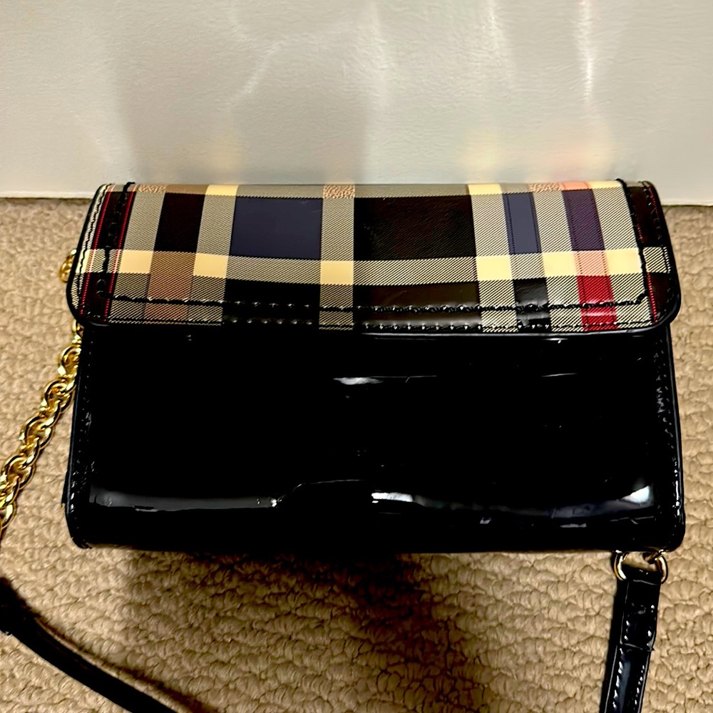 Black Patton leather with a Burberry like detail